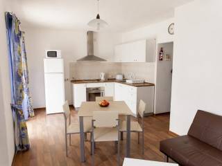 Salón y cocina apartamento Drayton